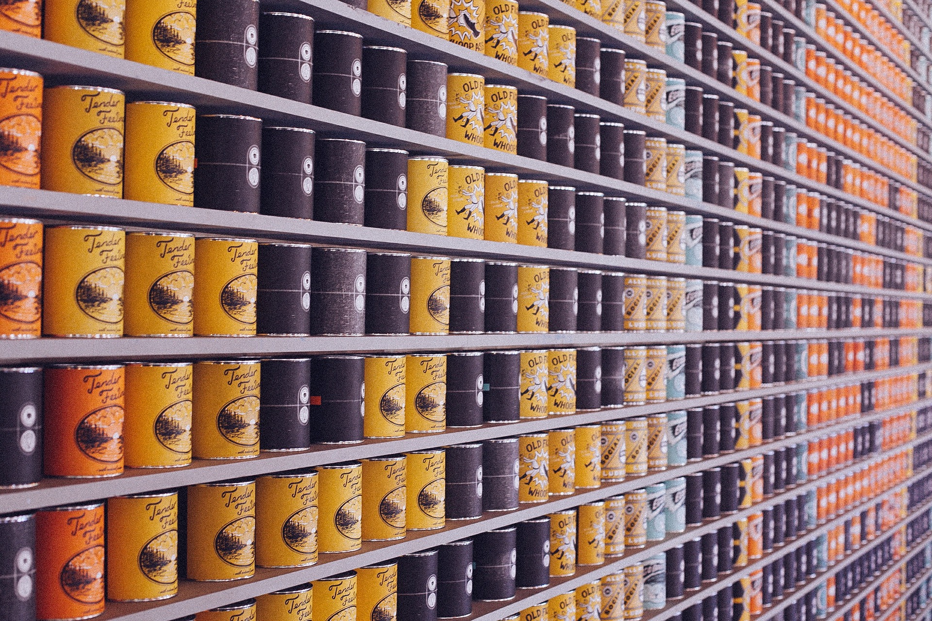 An aisle of canned food in a grocery store