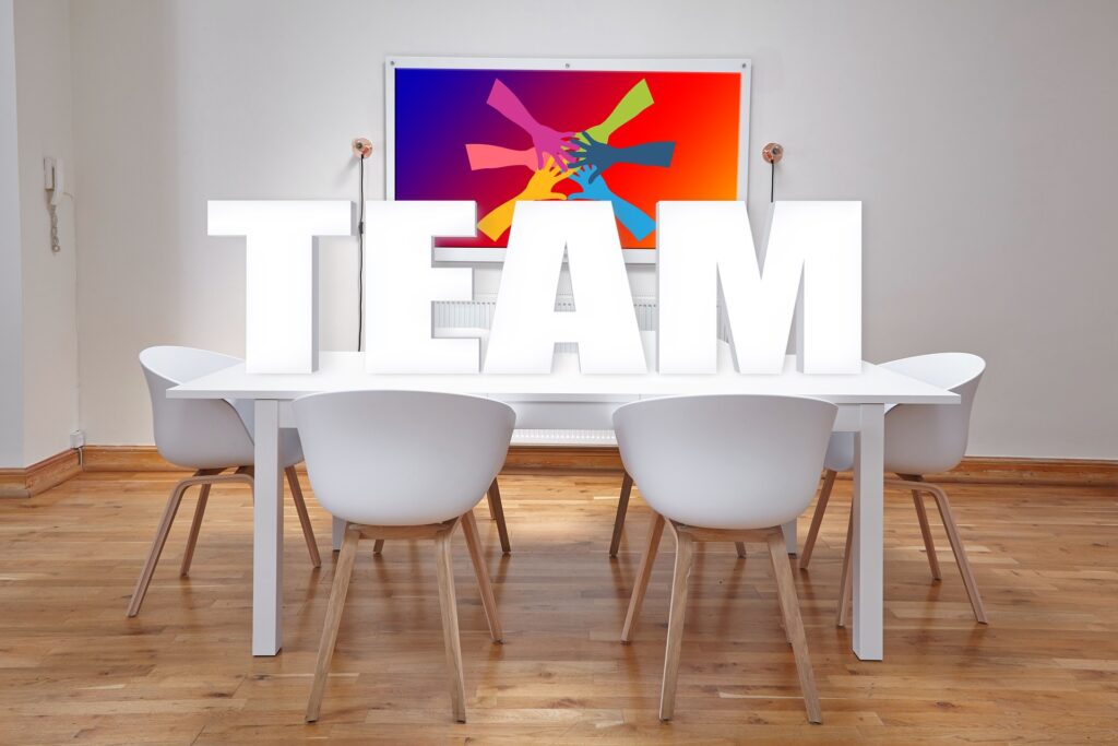 a table with the word TEAM spelled out on the table