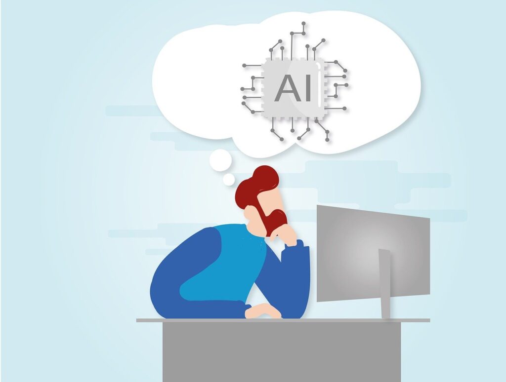 A man stares at his computer and contemplates AI.